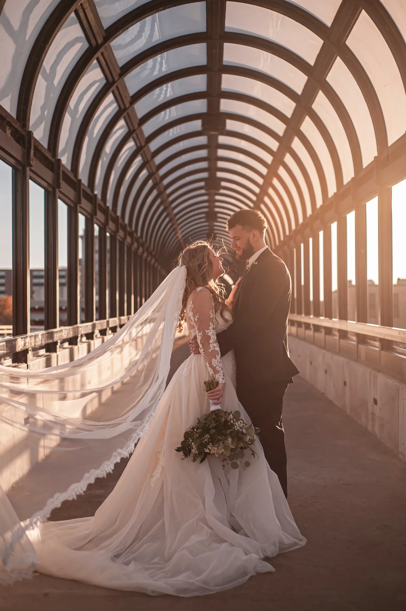 Engagement photos in the Cedar Valley, couple by the river at golden hour