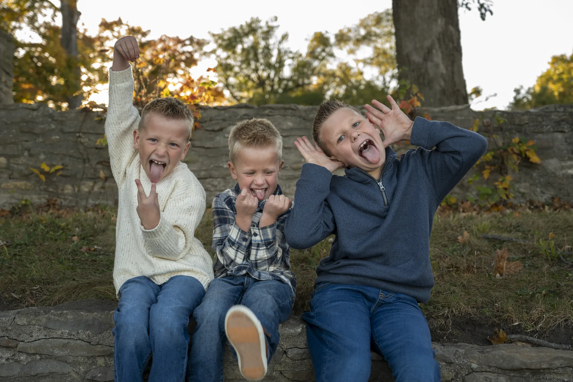 Family photos in the Cedar Valley, brothers making silly faces
