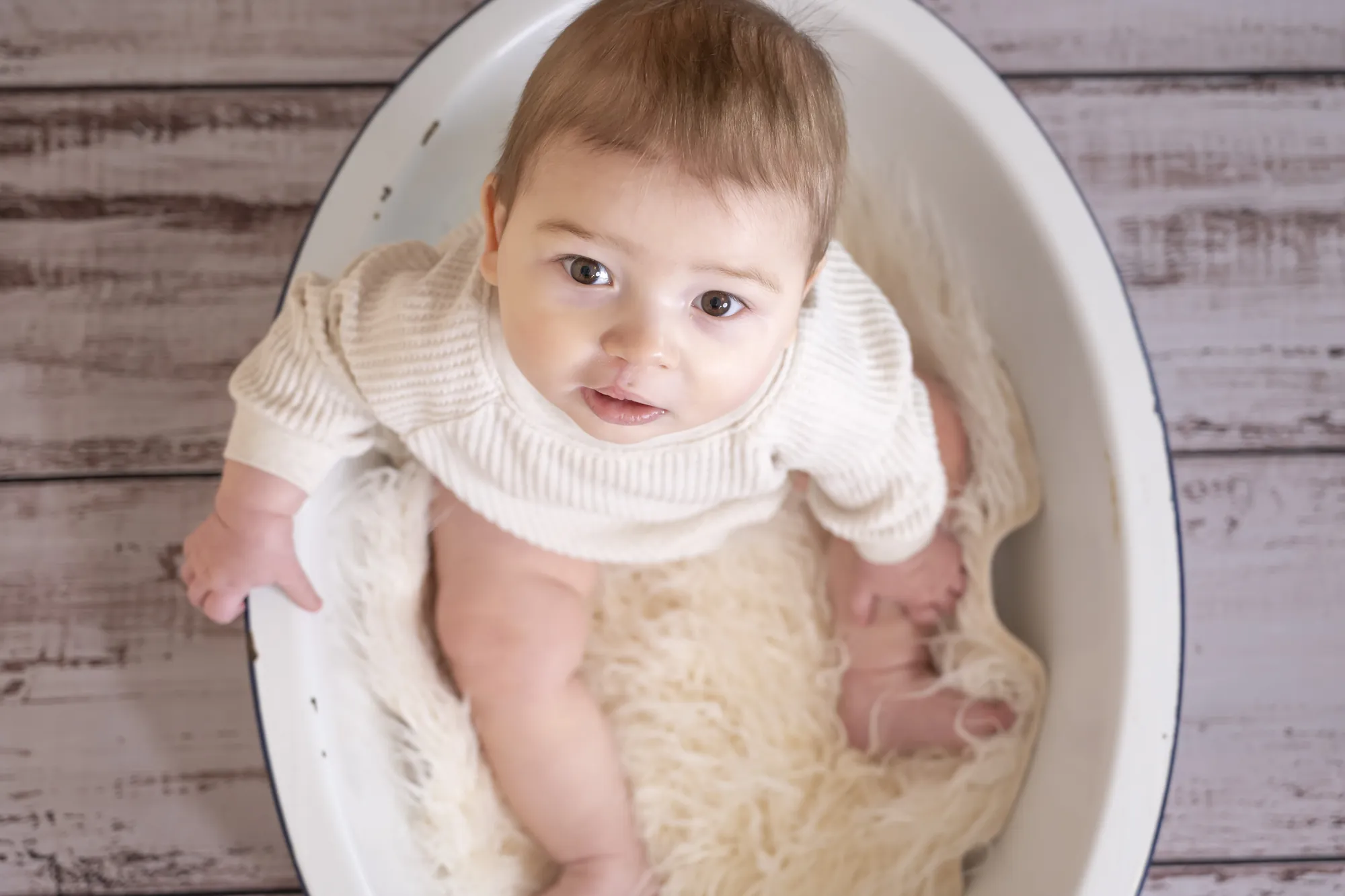 Milestone photos in the Cedar Valley, baby sitting in a vintage tub