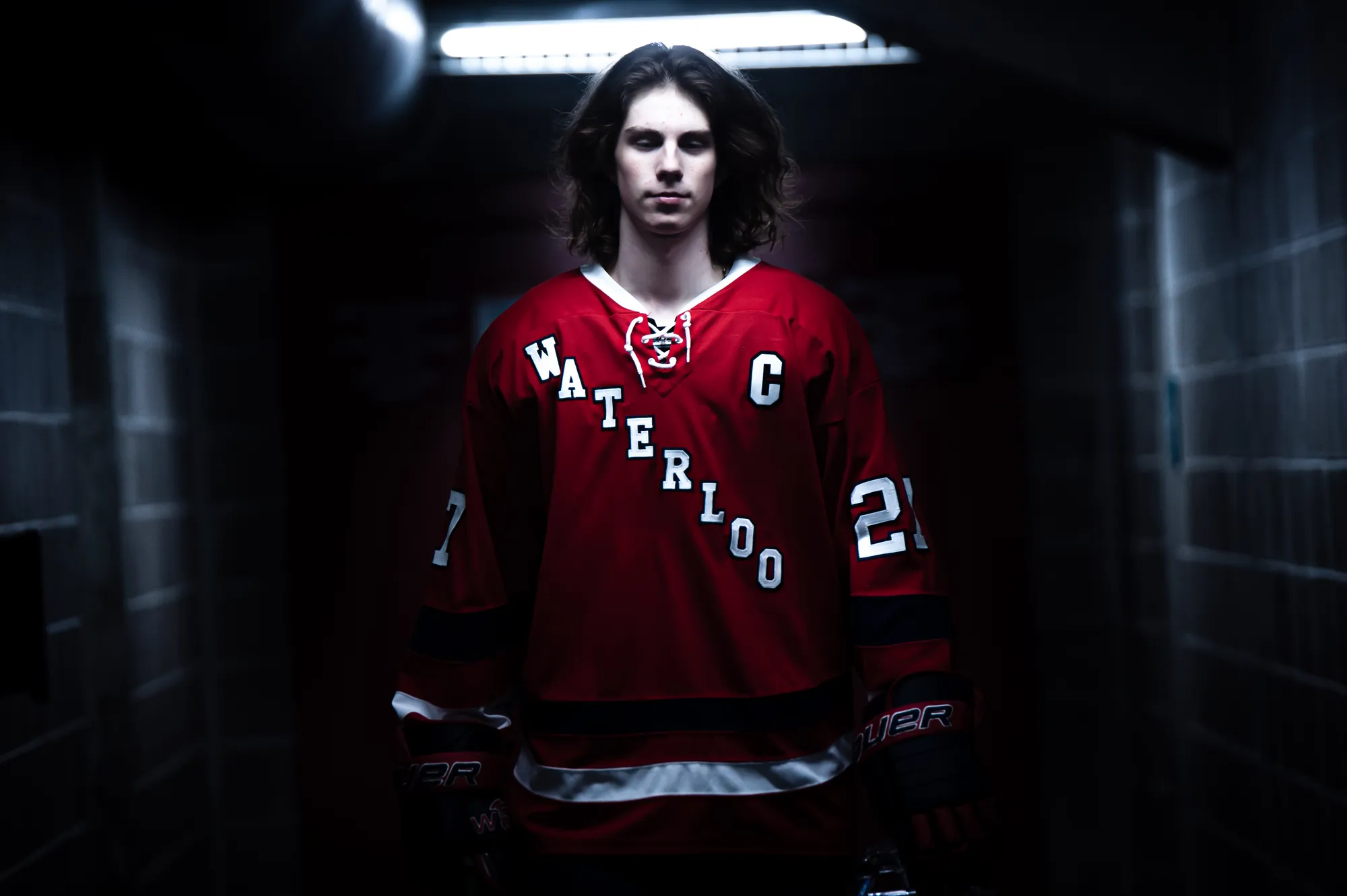 Sports photos in Waterloo, hockey captain in the tunnel