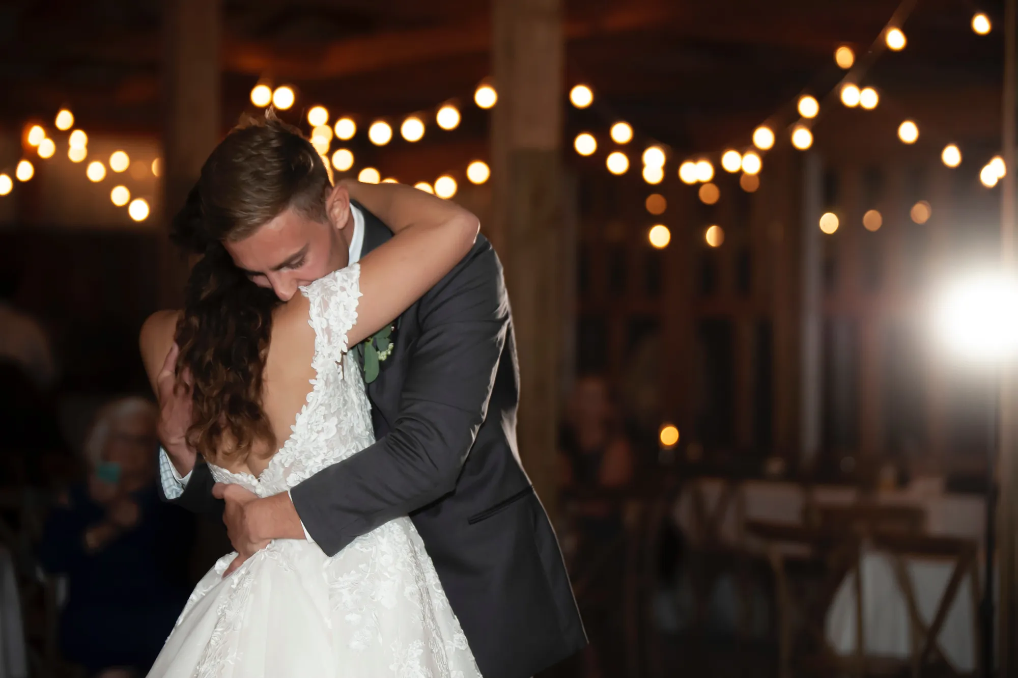 Wedding photography in the Cedar Valley, first dance under string lights