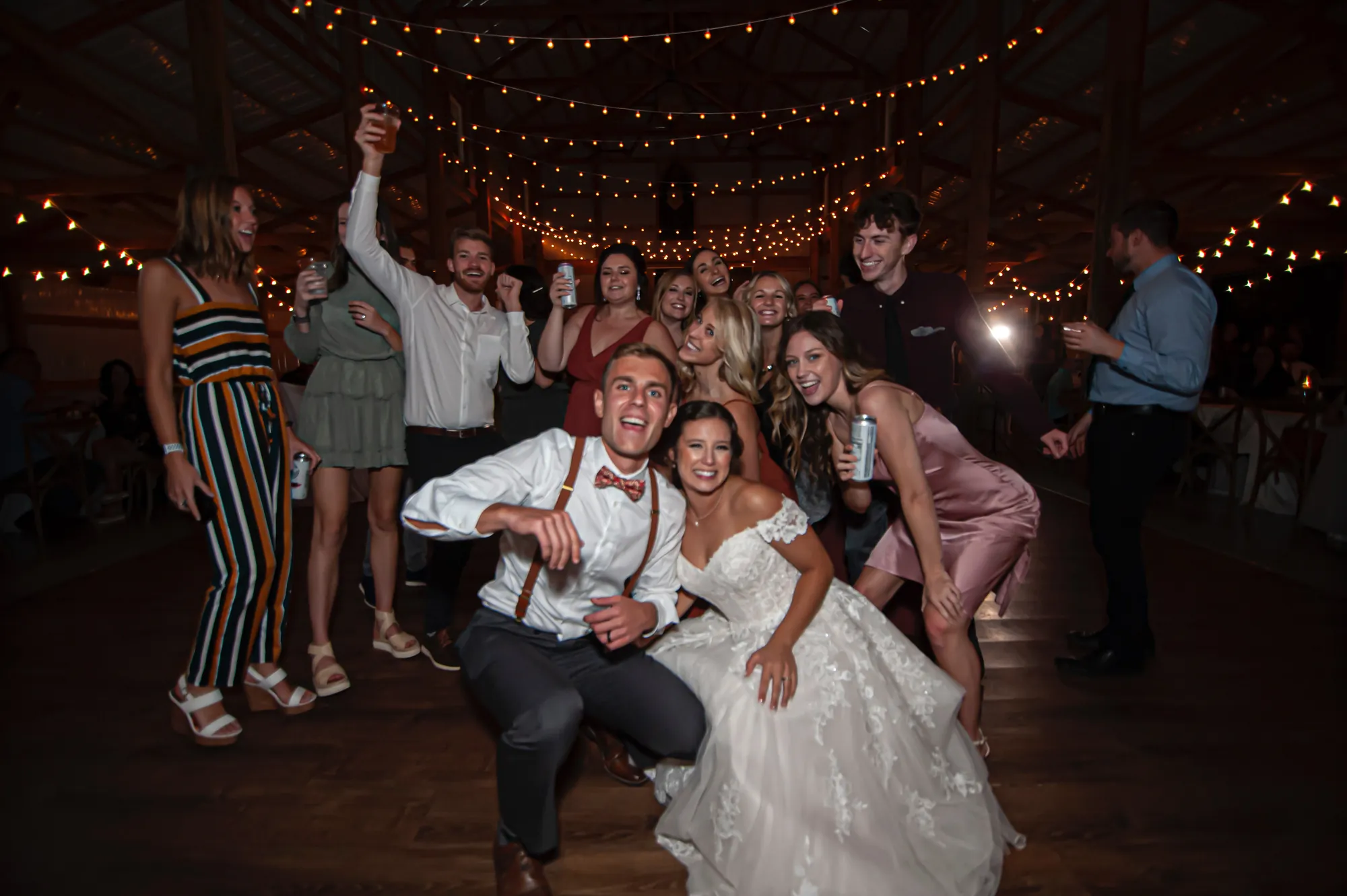 Wedding reception in the Cedar Valley, newlyweds and friends on the dance floor